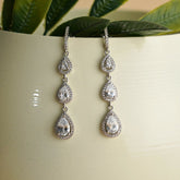 Long pear shaped silver earrings